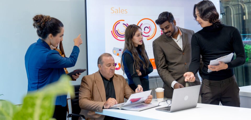 Group of business men and women with multiethnic and multigeneration discuss in the conference room to get the success of the project.