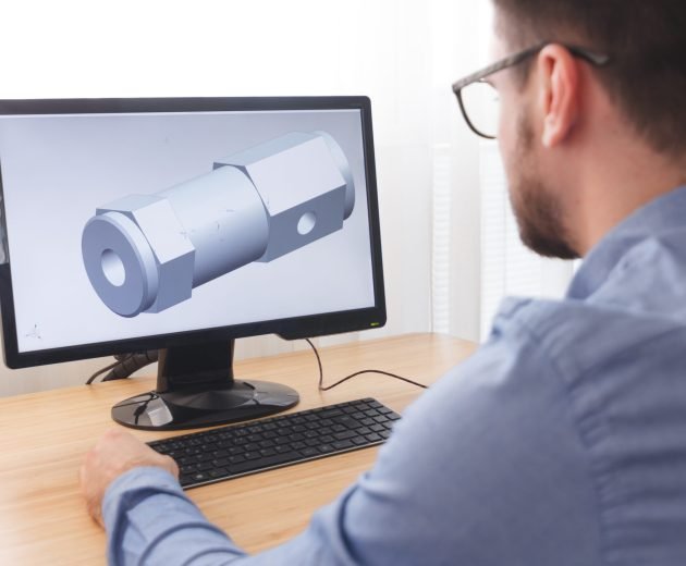Engineer, Constructor, Designer in Glasses Working on a Personal Computer. He is Creating, Designing a New 3D Model of Mechanical Component in CAD Program. Freelance Work, LOS ANGELES, CALIFORNIA – 25.10.2019. Engineer, Constructor, Designer in Glasses Working on a Personal Computer. He is Creating, Designing a New 3D Model of Mechanical Component in CAD Program. Freelance Work, LOS ANGELES, CALIFORNIA - 25.10.2019